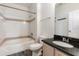 Functional bathroom with a tub and shower combination, a vanity with granite countertop, and tile flooring at 6611 Time Square Ave # 103, Orlando, FL 32835