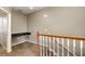 Upstairs hallway with a built-in granite countertop workspace and white railing offering functional style at 6611 Time Square Ave # 103, Orlando, FL 32835