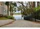 Street access point to the lake with metal guardrail in view at 6611 Time Square Ave # 103, Orlando, FL 32835