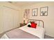 Cozy bedroom with plenty of natural light from the large windows and featuring ample storage at 677 Post Oak Cir # 115, Altamonte Springs, FL 32701
