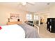 Spacious bedroom with large windows, mirrored closet doors, and plenty of space to relax at 677 Post Oak Cir # 115, Altamonte Springs, FL 32701