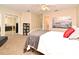 Airy bedroom with neutral walls, cozy grey blanket, and plenty of natural light, creating a welcoming space at 677 Post Oak Cir # 115, Altamonte Springs, FL 32701