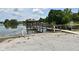Community boat ramp and loading dock with a view of the water at 677 Post Oak Cir # 115, Altamonte Springs, FL 32701