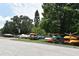 Community boat and kayak storage lot with various sized boats at 677 Post Oak Cir # 115, Altamonte Springs, FL 32701