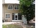 Back of the house, shows the screened in porch and second story windows at 677 Post Oak Cir # 115, Altamonte Springs, FL 32701