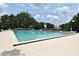 Community pool with plenty of room to lounge and enjoy the weather at 677 Post Oak Cir # 115, Altamonte Springs, FL 32701