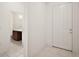 Entryway featuring tile flooring and views into the bathroom at 7054 Cruz Ct, Lakeland, FL 33813
