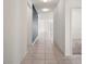 Hallway featuring tile flooring with views into other rooms at 7054 Cruz Ct, Lakeland, FL 33813