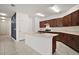 Beautiful kitchen with island, stainless appliances and a large pantry, perfect for meal preparation at 7054 Cruz Ct, Lakeland, FL 33813