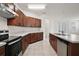 Well-appointed kitchen with stainless steel appliances and lots of cabinet space, perfect for cooking at 7054 Cruz Ct, Lakeland, FL 33813