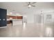 Open concept living space with tile flooring, and kitchen at 7054 Cruz Ct, Lakeland, FL 33813
