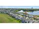 Scenic aerial view of a lakeside community, close to city amenities at 7500 Alpine Butterfly Ln, Orlando, FL 32819