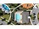 Enjoy sunny days poolside at this community pool surrounded by lounge chairs and landscaped grounds at 7500 Alpine Butterfly Ln, Orlando, FL 32819