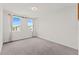 Spacious bedroom with large windows and soft pink curtains allowing ample natural light at 7500 Alpine Butterfly Ln, Orlando, FL 32819