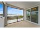 Spacious screened porch overlooking the lake at 7500 Alpine Butterfly Ln, Orlando, FL 32819