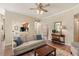 Bright living area featuring an open layout with a breakfast bar and modern decor at 7628 Bay Port Rd # 43, Orlando, FL 32819