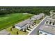 Scenic aerial view showcasing the property's proximity to green spaces and community features at 812 Driving Range Ct, Reunion, FL 34747