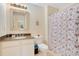 Full bathroom includes a shower-tub combination and a single sink vanity at 8447 Crystal Cove Loop # 8447, Kissimmee, FL 34747