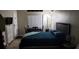 Cozy bedroom featuring a comfortable bed, dining table, and plenty of natural light at 8447 Crystal Cove Loop # 8447, Kissimmee, FL 34747