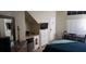 Comfortable bedroom with ample natural light, mini fridge, dining table, and convenient amenities at 8447 Crystal Cove Loop # 8447, Kissimmee, FL 34747