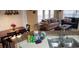 Bright living area with modern finishes featuring couches, countertops, and lots of lighting at 8447 Crystal Cove Loop # 8447, Kissimmee, FL 34747
