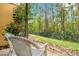 Relax on this private, cozy outdoor patio surrounded by lush greenery at 8447 Crystal Cove Loop # 8447, Kissimmee, FL 34747