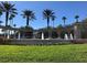 Community water fountain with palm trees and manicured lawn at 8447 Crystal Cove Loop # 8447, Kissimmee, FL 34747