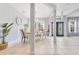 Inviting dining room with neutral walls, tiled floor, and an abundance of natural light at 8676 Currituck Sound Ln, Orlando, FL 32829