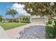 Beautiful home featuring a brick driveway, well-maintained lawn, and a three-car garage at 9843 Nokay Dr, Orlando, FL 32836