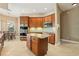 Well-equipped kitchen with a center island, stainless steel appliances, and ample counter space at 9843 Nokay Dr, Orlando, FL 32836