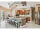 Large kitchen with an island, stainless steel appliances, ample cabinets, and open space at 9843 Nokay Dr, Orlando, FL 32836