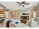 Spacious living room with an open floor plan, tile flooring, and comfortable seating at 9843 Nokay Dr, Orlando, FL 32836