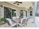 Inviting screened patio featuring ample seating and a serene outdoor living space with lush landscaping at 9843 Nokay Dr, Orlando, FL 32836