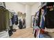 Spacious walk-in closet with rods and shelves to organize clothes and accessories at 9843 Nokay Dr, Orlando, FL 32836