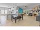 Open-concept living space combining kitchen, dining, and living area with a fireplace feature at 10124 Pink Carnation Ct, Orlando, FL 32825