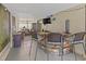 Spacious outdoor patio features a bar, seating area, and comfortable seating at 10124 Pink Carnation Ct, Orlando, FL 32825