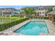 A community pool provides residents with a relaxing outdoor space surrounded by townhomes at 1027 Cedar Bay Ln, Winter Springs, FL 32708