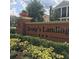 Entrance sign for Jesup's Landing surrounded by lush green landscaping at 1027 Cedar Bay Ln, Winter Springs, FL 32708