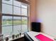 Bright view of the pond from desk in bedroom at 1027 Cedar Bay Ln, Winter Springs, FL 32708
