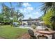 Backyard featuring a pool with rock detail, a boat parking area, and comfortable seating at 103 Cherry Hill Cir, Longwood, FL 32779