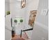 Entryway with decorative wreaths, hardwood floors, statement wall decor, and grand staircase at 103 Cherry Hill Cir, Longwood, FL 32779