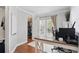 Functional home office with a large desk, walk-in closet, and plenty of natural light at 103 Cherry Hill Cir, Longwood, FL 32779