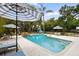 Sparkling swimming pool with shaded areas and landscaped surroundings for ultimate relaxation at 103 Cherry Hill Cir, Longwood, FL 32779