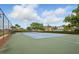 Well-maintained community tennis court with lush green surroundings at 103 Cherry Hill Cir, Longwood, FL 32779