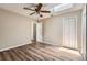 Room features modern floors, skylight, ceiling fan, closet and a door at 108 N Truett St, Leesburg, FL 34748