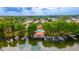 Aerial view of lakefront property with private pool and boat docks at 1177 Paseo Del Mar # D, Casselberry, FL 32707