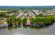 Aerial view of lakefront property with boat docks and private pool at 1177 Paseo Del Mar # D, Casselberry, FL 32707
