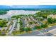 Aerial view of the neighborhood with a large lake in the background at 1177 Paseo Del Mar # D, Casselberry, FL 32707