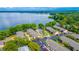 Beautiful aerial view of lakeside apartments, community pool, parking, and lush green landscaping at 1177 Paseo Del Mar # D, Casselberry, FL 32707