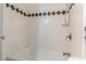 Shower with white tile and updated fixtures at 1177 Paseo Del Mar # D, Casselberry, FL 32707